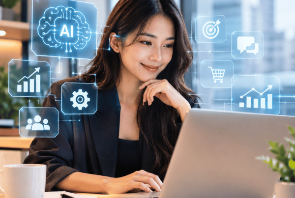 Benefits of AI in business showing a professional using AI technology to improve productivity, efficiency and business growth