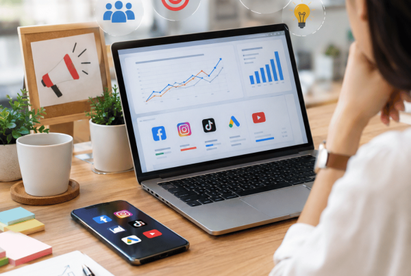 Digital marketing professional analysing advertising performance, audience targeting and campaign results on a laptop